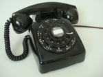 Putting down hanging up office phone
