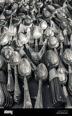 Person throwing up spoons - Sound