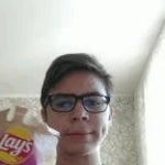 boy eating chips