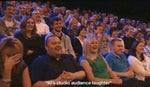 Crowd laughing