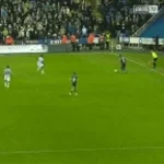 Dundee FC fans sing during derby