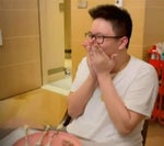 fat asian guy laughing