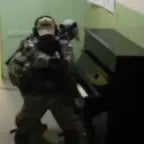 Polish soldier plays piano on duty