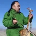 Asian Boy sing by mountain