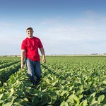 black polish farmer with a bamboo stick