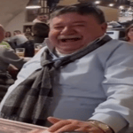 Guy laughing at whistle slowed