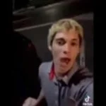 guy screaming for help while holding a chik fil a drink