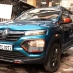 Villager drives his 2004 Aikawa Maxim