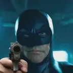 The Dark Knight beating someone up