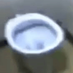 Guy kicks a toilet